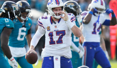 Buffalo Bills quarterback Josh Allen gets up after collecting a first down near the Jacksonvill ...