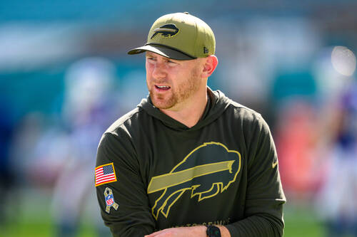 Buffalo Bills offensive coordinator Joe Brady stands on the field before an NFL football game a ...