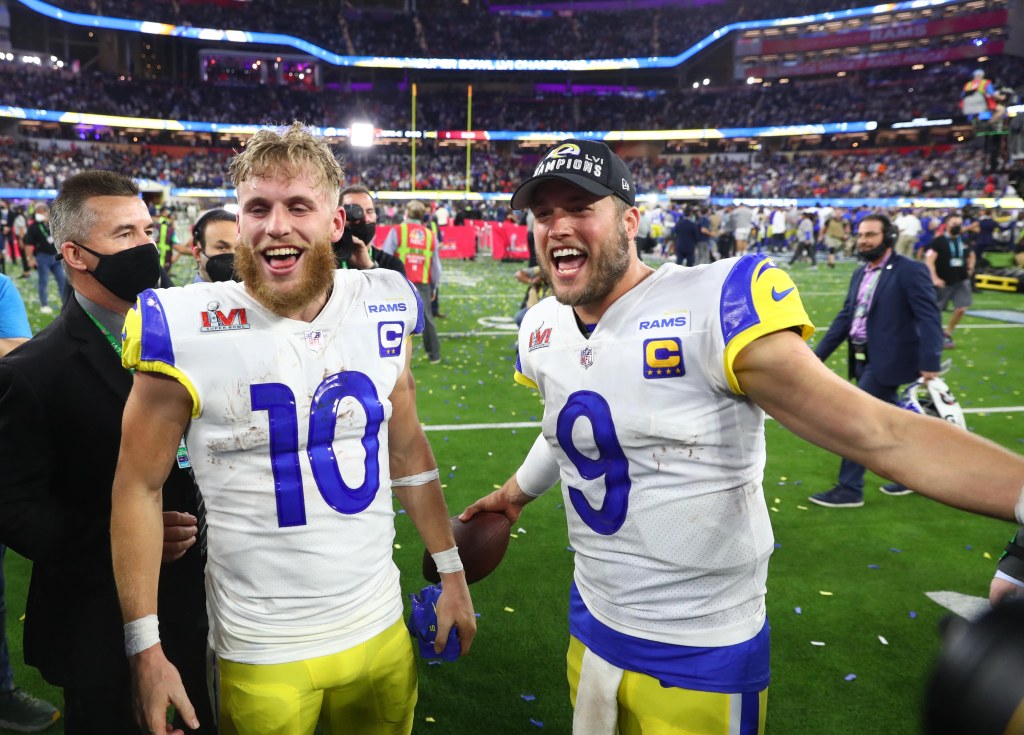 Los Angeles Rams wide receiver Cooper Kupp and quarterback Matthew Stafford celebrating their Super Bowl LVI victory.