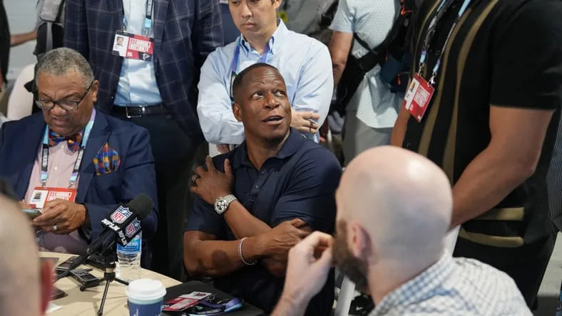 Raheem Morris speaks to reporters at the NFL Annual League Meeting.