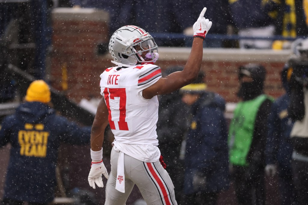 Carnell Tate #17 of the Ohio State Buckeyes celebrates after a touchdown during the third quarter against the Michigan Wolverines at Michigan Stadium on November 29, 2025 in Ann Arbor, Michigan. 