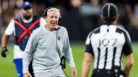 Pete Carroll of the Las Vegas Raiders talks with a referee during the game against the Los Angeles Chargers at Allegiant Stadium on September 15, 2025 in Las Vegas.