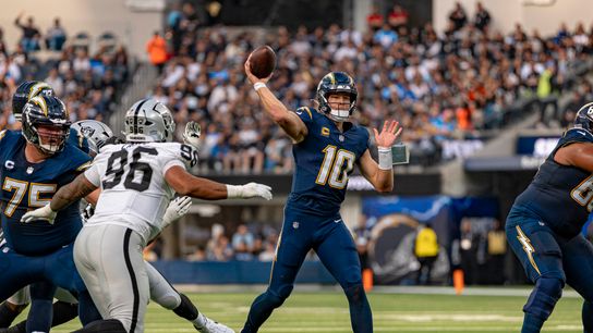 Los Angeles Chargers quarterback, Justin Herbert (10) passing during an NFL football game against the Las Vegas Raiders on November 30, 2025 in Los Angeles, CA.