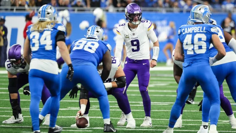 Nov 2, 2025; Detroit, Michigan, USA; Minnesota Vikings quarterback J.J. McCarthy (9) looks on before the snap against the Detroit Lions in the second quarter at Ford Field. Mandatory Credit: David Reginek-Imagn Images