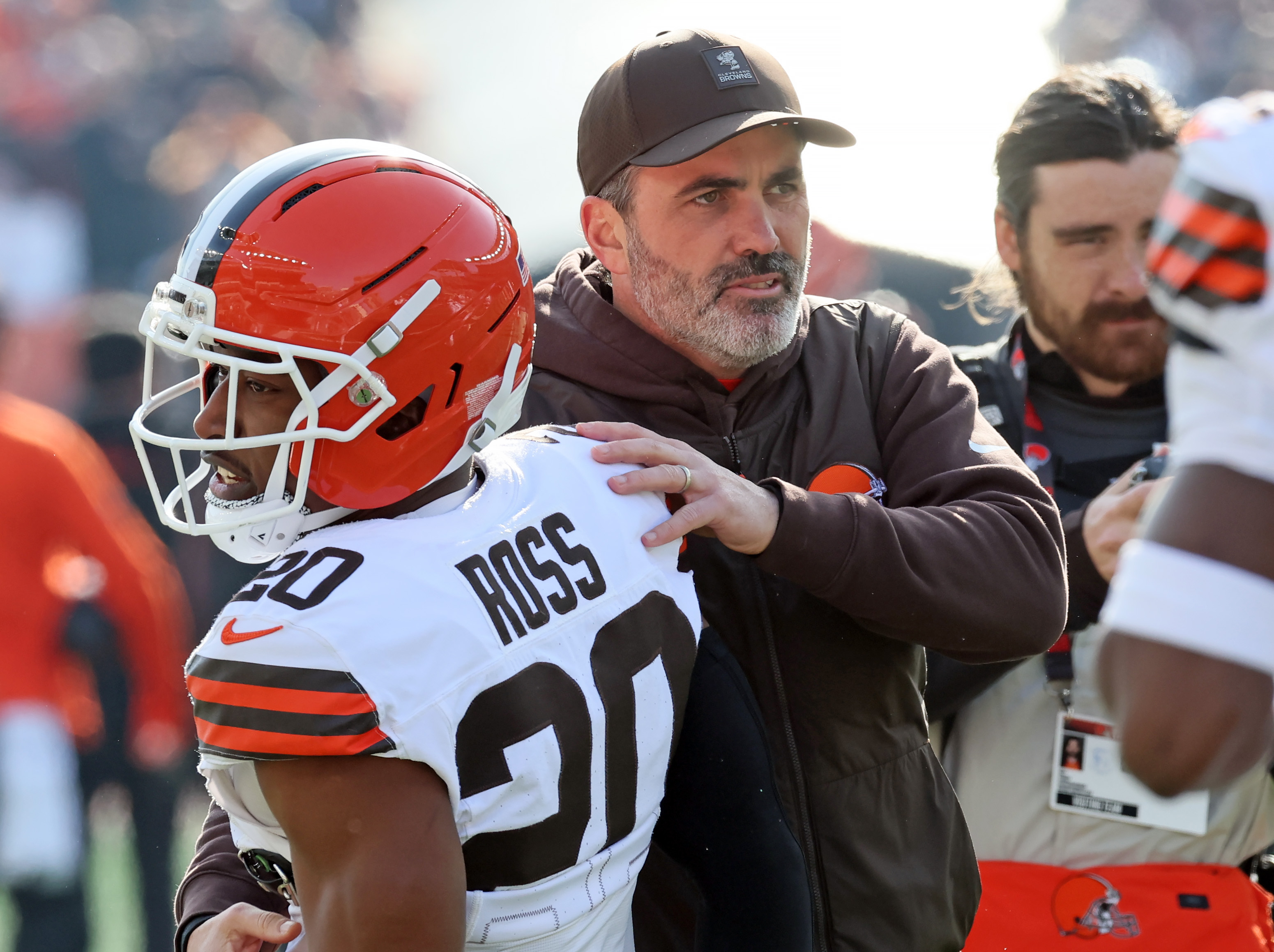 Cleveland Browns cornerback D'Angelo Ross greets Cleveland Browns head coach Kevin Stefanski during warm ups before the game against the Cincinnati Bengals. 