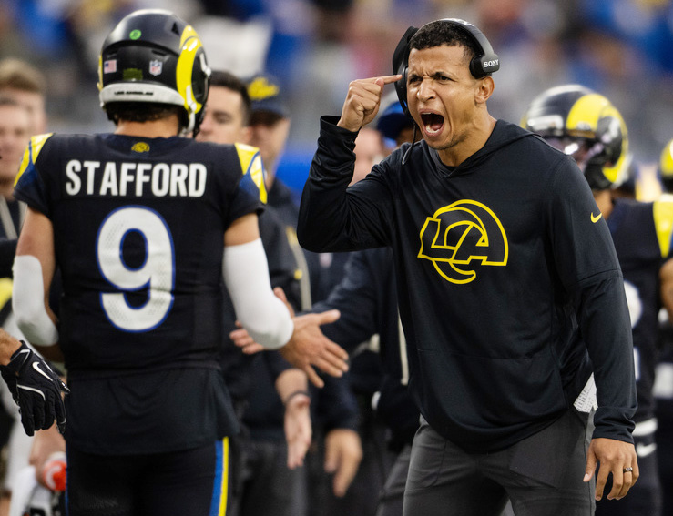 Los Angeles Rams pass game coordinator Nate Scheelhaase gestures during an NFL football game against the Seattle Seahawks, Sunday, Nov. 16, 2025, in Inglewood, Calif. 