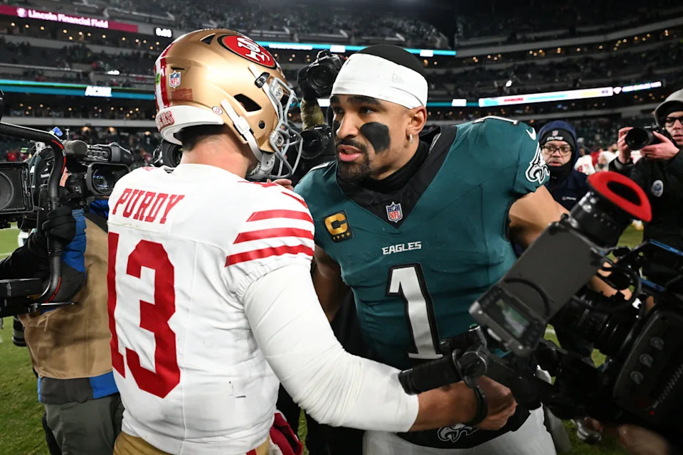 Jan 11, 2026; Philadelphia, PA, USA; San Francisco 49ers quarterback Brock Purdy (13) speaks with Philadelphia Eagles quarterback Jalen Hurts (1) after an NFC Wild Card Round game at Lincoln Financial Field. Mandatory Credit: Eric Hartline-Imagn Images© Eric Hartline-Imagn Images.