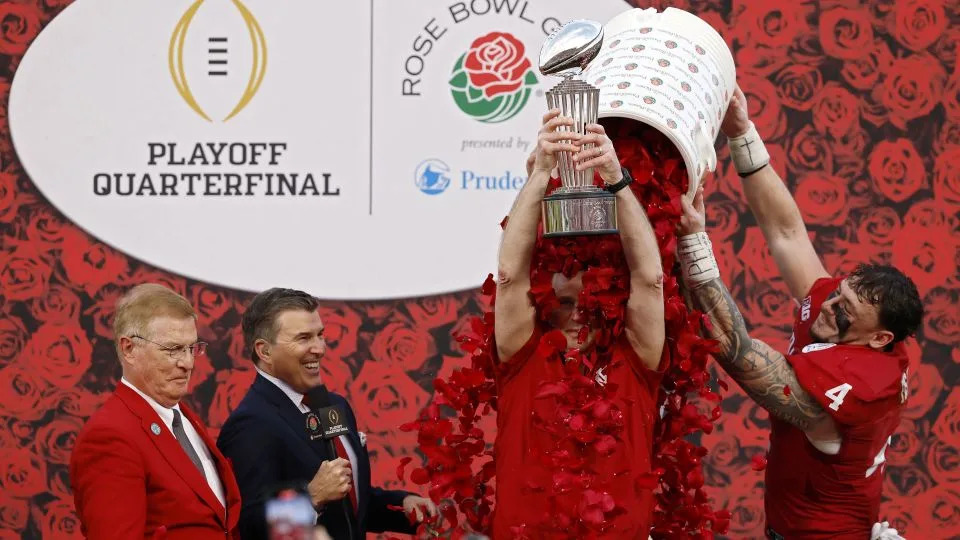 Hoosiers head coach Curt Cignetti celebrates with the Leishman Trophy. - Harry How/Getty Images