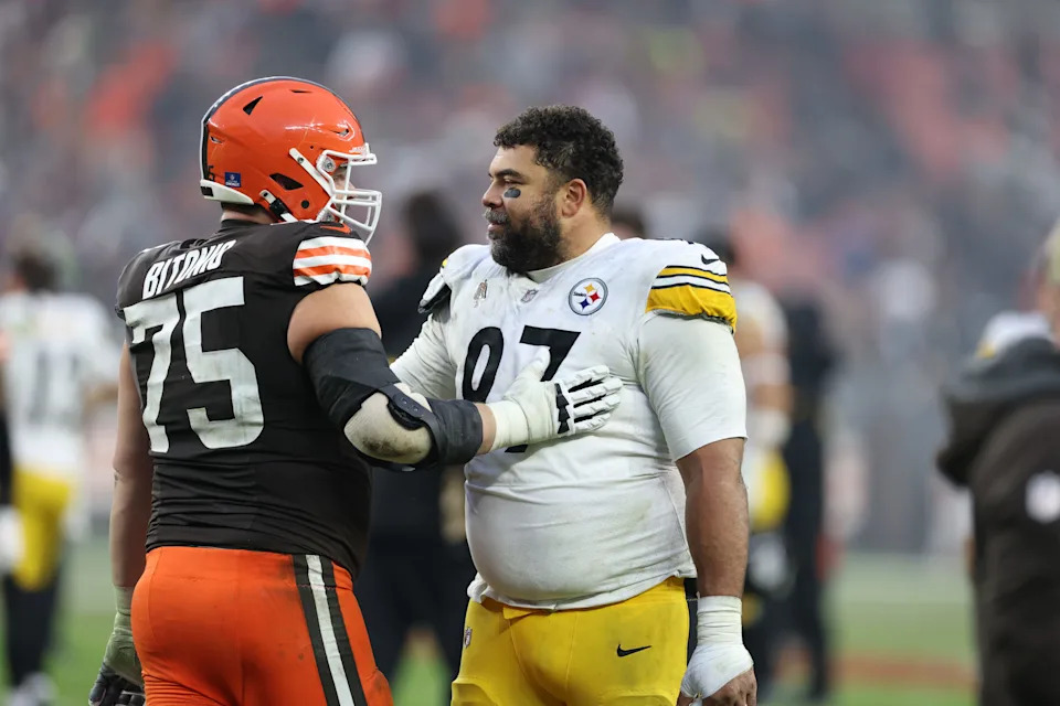 Dec 28, 2025; Cleveland, Ohio, USA; Cleveland Browns guard Joel Bitonio (75) and Pittsburgh Steelers defensive tackle Cameron Heyward (97) speak after the game at Huntington Bank Field. Mandatory Credit: Scott Galvin-Imagn Images