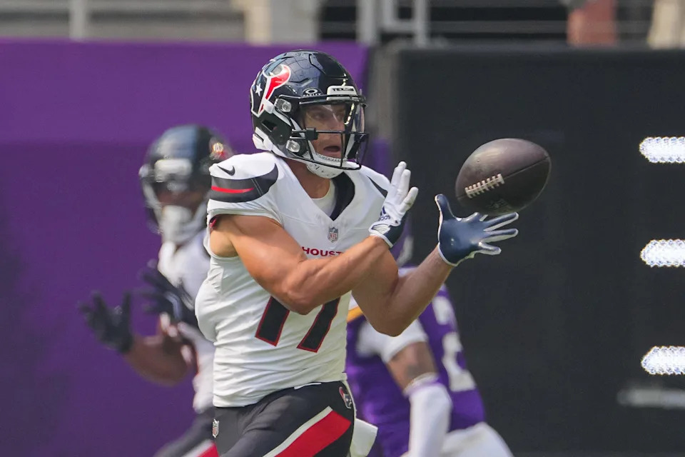 Aug 9, 2025; Minneapolis, Minnesota, USA; Houston Texans wide receiver Braxton Berrios (17) catches a pass for a touchdown against the Minnesota Vikings in the first quarter at U.S. Bank Stadium. Mandatory Credit: Brad Rempel-Imagn Images