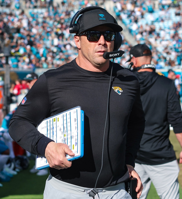 Jacksonville Jaguars offensive coordinator Grant Udinski walks the sideline during an NFL football game against the New York Jets, Sunday, Dec. 14, 2025, in Jacksonville, Fla. The Jaguars defeated the Jets 48-20.