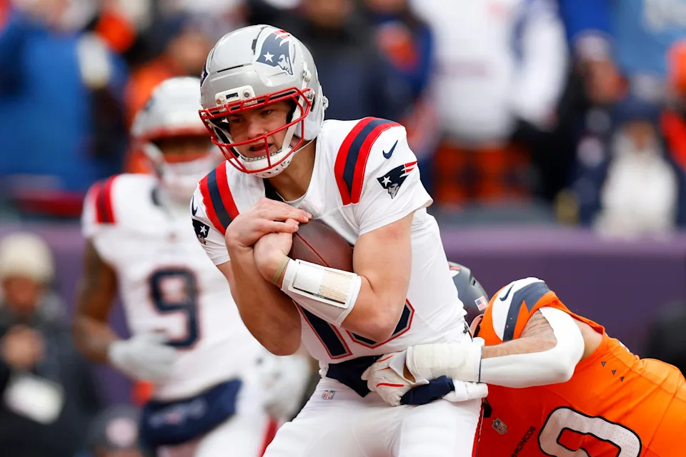 DENVER, COLORADO - JANUARY 25: Drake Maye #10 of the New England Patriots rushes for a touchdown during the second quarter in the AFC Championship Playoff game against the Denver Broncos at Empower Field At Mile High on January 25, 2026 in Denver, Colorado. (Photo by Justin Edmonds/Getty Images)