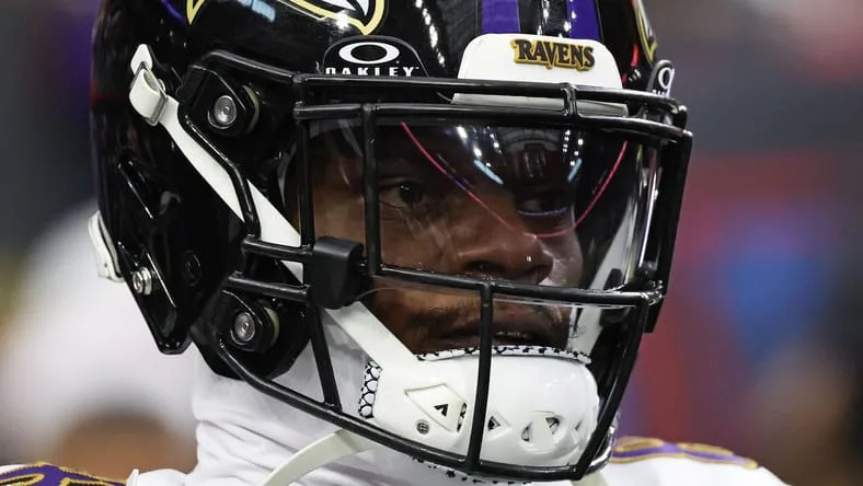Lamar Jackson warming up before Ravens game at NRG Stadium.