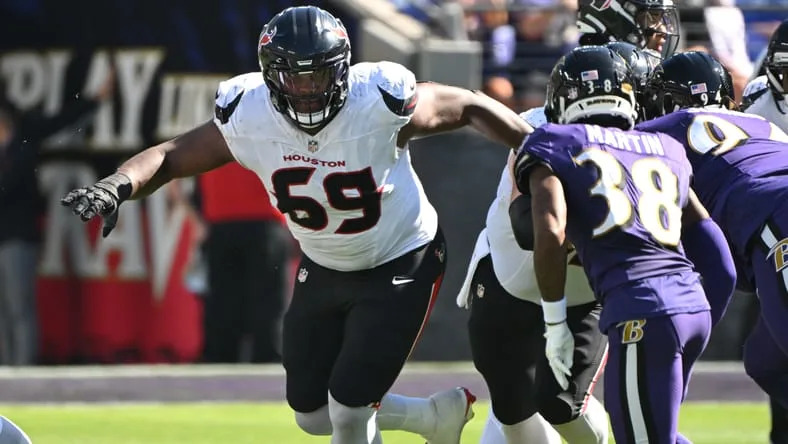 Ed Ingram blocking during Texans vs. Ravens game.