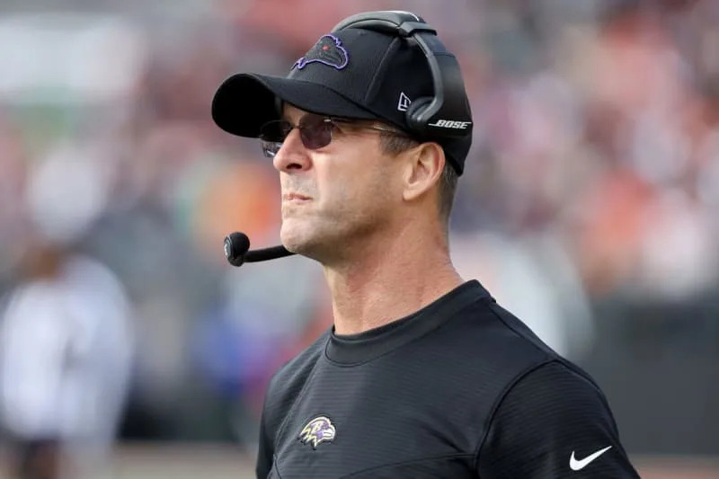 CINCINNATI, OHIO – DECEMBER 26: Head coach John Harbaugh of the Baltimore Ravens on the sidelines during the second quarter in the game against the Cincinnati Bengals at Paul Brown Stadium on December 26, 2021 in Cincinnati, Ohio. (Photo by Andy Lyons/Getty Images)