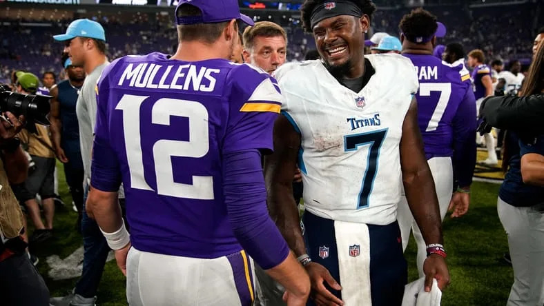 Malik Willis and Nick Mullens speak after a preseason game at U.S. Bank Stadium.