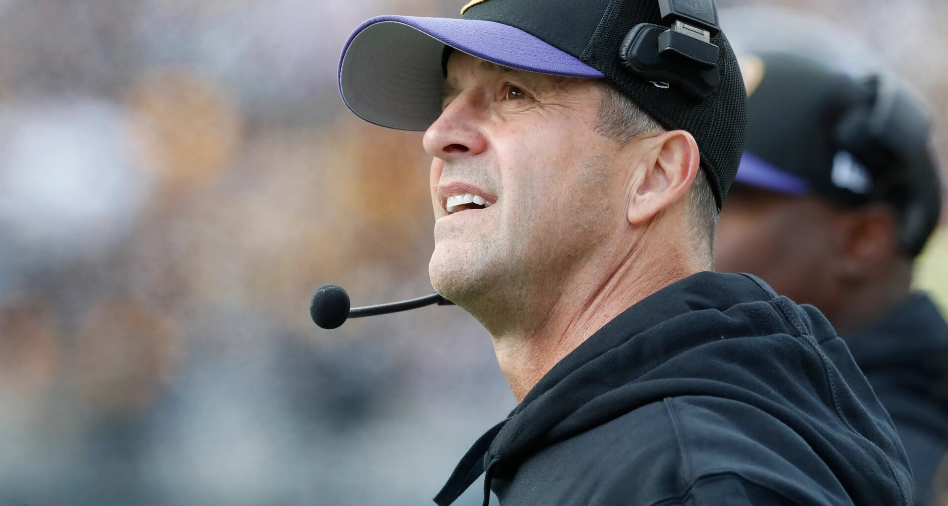 John Harbaugh watching film on Tennessee Titans QB Cam Ward