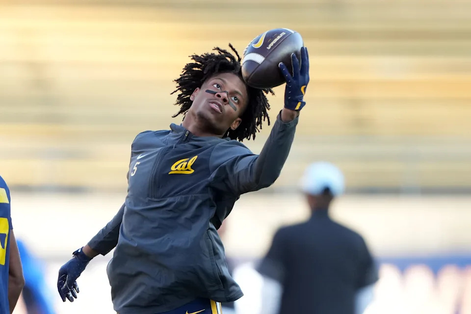 Nov 29, 2025; Berkeley, California, USA; California Golden Bears defensive back Hezekiah Masses (5) warms up before the game against the Southern Methodist Mustangs at California Memorial Stadium. Mandatory Credit: Darren Yamashita-Imagn Images