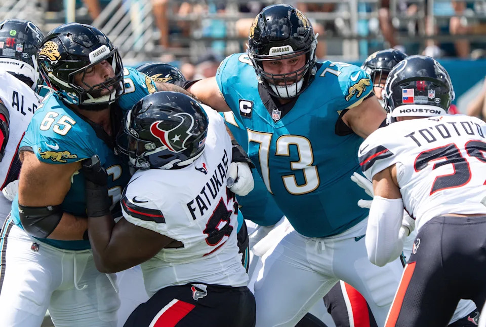 Jacksonville Jaguars offensive tackle Patrick Mekari (65) matches up against Houston Texans defensive tackle Foley Fatukasi (91) during the first quarter between the Houston Texans and the Jacksonville Jaguars Sunday September 21, 2025 at EverBank Stadium in Jacksonville, Fla. [Doug Engle/Florida Times-Union]