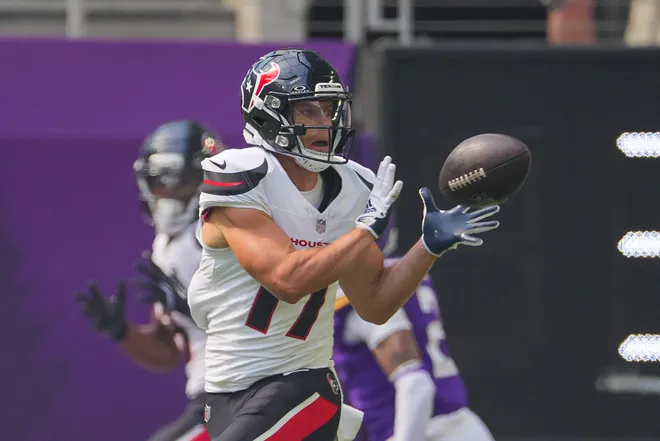 Aug 9, 2025; Minneapolis, Minnesota, USA; Houston Texans wide receiver Braxton Berrios (17) catches a pass for a touchdown against the Minnesota Vikings in the first quarter at U.S. Bank Stadium. Mandatory Credit: Brad Rempel-Imagn Images