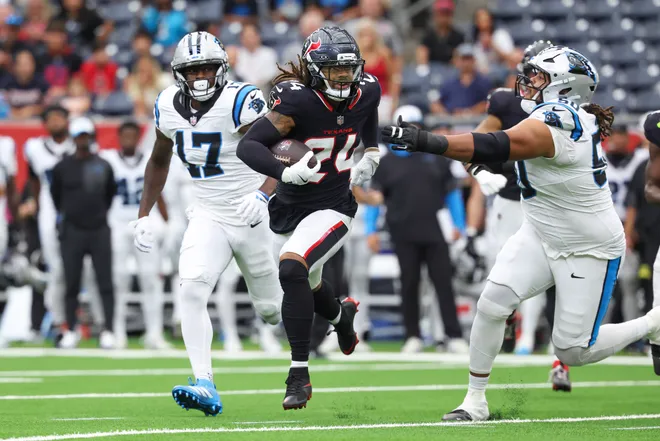 Aug 16, 2025; Houston, Texas, USA; Houston Texans cornerback Derek Stingley Jr. (24) runs with the ball during the first quarter against the Carolina Panthers at NRG Stadium. Mandatory Credit: Troy Taormina-Imagn Images