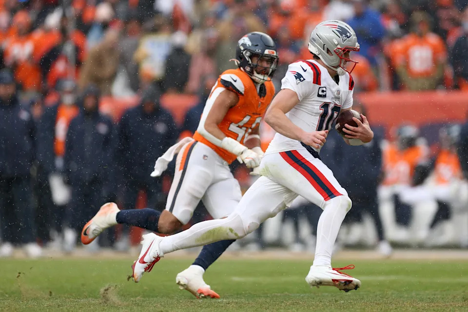 DENVER, COLORADO - JANUARY 25: Drake Maye #10 of the New England Patriots rushes for yards during the third quarter in the AFC Championship Playoff game against the Denver Broncos at Empower Field At Mile High on January 25, 2026 in Denver, Colorado. (Photo by Matthew Stockman/Getty Images)