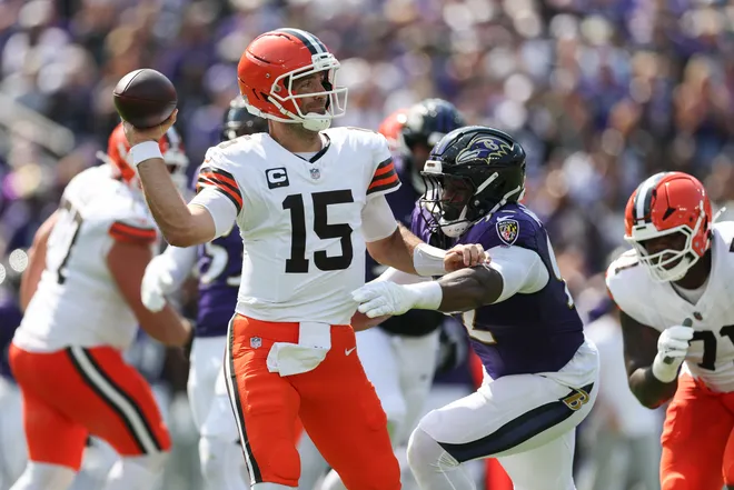 BALTIMORE, MARYLAND - SEPTEMBER 14: Joe Flacco #15 of the Cleveland Browns throws a pass as Nnamdi Madubuike #92 of the Baltimore Ravens pressures during the second quarter at M&T Bank Stadium on September 14, 2025 in Baltimore, Maryland. (Photo by Rob Carr/Getty Images)