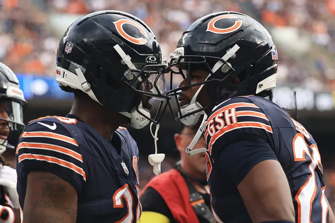 CHICAGO, ILLINOIS - SEPTEMBER 21: Tyrique Stevenson #29 of the Chicago Bears celebrates a fumble recovery against the Dallas Cowboys with teammate Elijah Hicks #22 during the first quarter at Soldier Field on September 21, 2025 in Chicago, Illinois. (Photo by Geoff Stellfox/Getty Images)