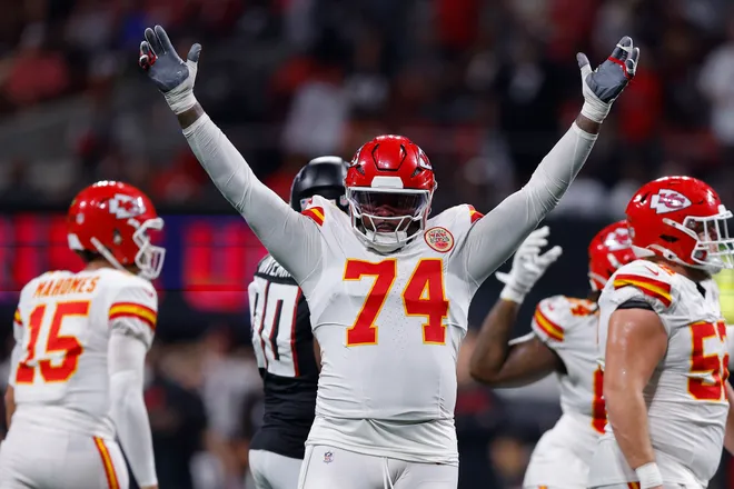 ATLANTA, GEORGIA - SEPTEMBER 22: Jawaan Taylor #74 of the Kansas City Chiefs celebrates the touchdown of JuJu Smith-Schuster #9 of the Kansas City Chiefs during the third quarter against the Atlanta Falcons at Mercedes-Benz Stadium on September 22, 2024 in Atlanta, Georgia. (Photo by Todd Kirkland/Getty Images)