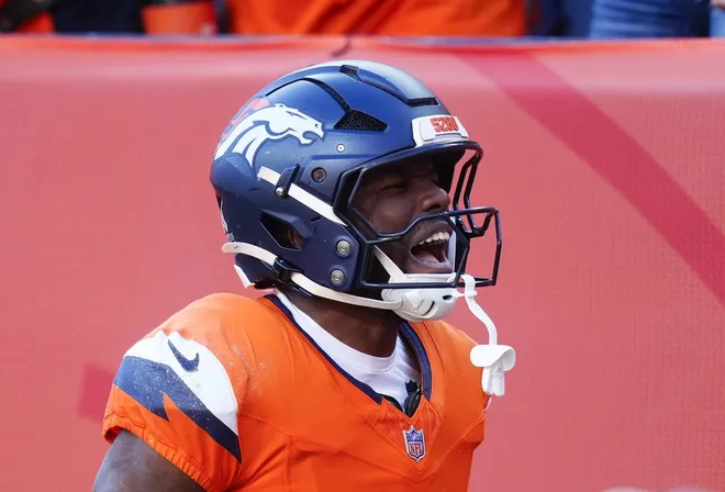 Nov 16, 2025; Denver, Colorado, USA; Denver Broncos wide receiver Marvin Mims Jr. (19) reacts after a punt return against the Kansas City Chiefs during the first quarter of the game at Empower Field at Mile High.