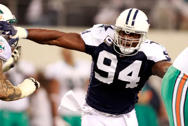 Nov 24, 2011; Arlington, TX, USA; Dallas Cowboys linebacker DeMarcus Ware (94) rushes the passer during the third quarter of the game against the Miami Dolphins on Thanksgiving day at Cowboys Stadium. Mandatory Credit: Tim Heitman-USA TODAY Sports