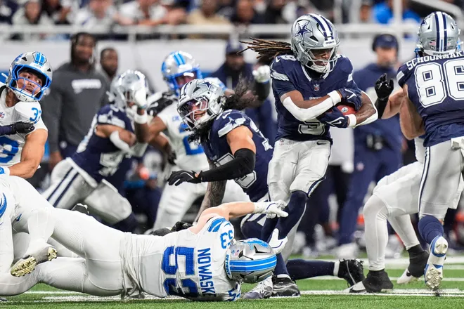 Detroit Lions linebacker Trevor Nowaske (53) tackles Dallas Cowboys kick returner KaVontae Turpin (9) during the second half at Ford Field in Detroit on Thursday, Dec. 4, 2025.