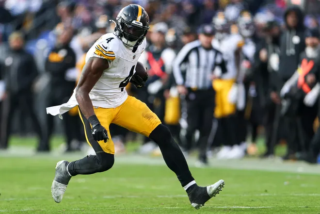 BALTIMORE, MARYLAND - DECEMBER 07: DK Metcalf #4 of the Pittsburgh Steelers makes a catch during the third quarter against the Baltimore Ravens at M&T Bank Stadium on December 07, 2025 in Baltimore, Maryland. (Photo by Scott Taetsch/Getty Images)