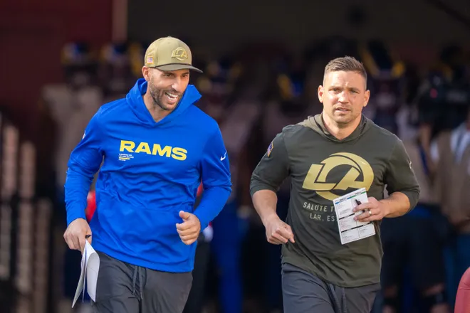 November 9, 2025; Santa Clara, California, USA; Los Angeles Rams quarterbacks coach Dave Ragone (left) and defensive coordinator Chris Shula (right) before the game against the San Francisco 49ers at Levi's Stadium. Mandatory Credit: Kyle Terada-Imagn Images