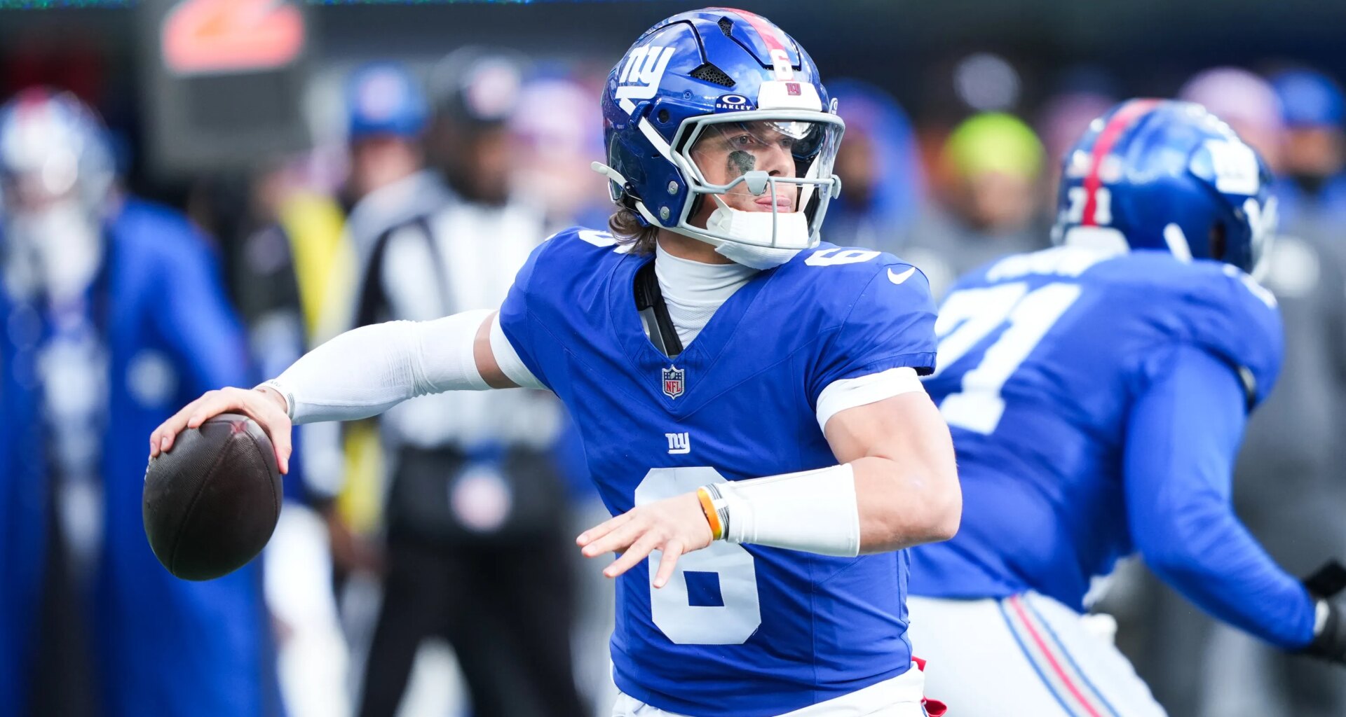 John Harbaugh studying film on New York Giants QB Jaxson Dart