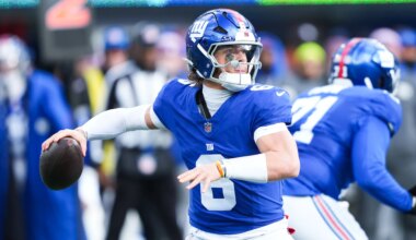 John Harbaugh studying film on New York Giants QB Jaxson Dart