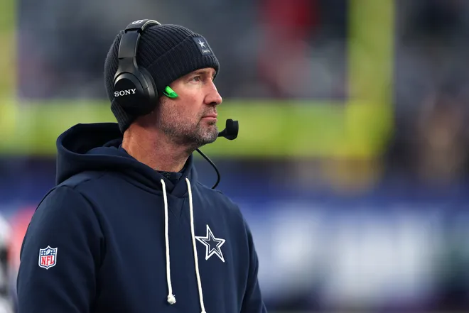 EAST RUTHERFORD, NEW JERSEY - JANUARY 04: Head coach Brian Schottenheimer of the Dallas Cowboys looks on during the second half against the New York Giants at MetLife Stadium on January 04, 2026 in East Rutherford, New Jersey. (Photo by Ishika Samant/Getty Images)