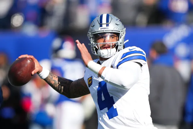 Jan 4, 2026; East Rutherford, New Jersey, USA; Dallas Cowboys quarterback Dak Prescott (4) warms up before the game against the New York Giants at MetLife Stadium. Mandatory Credit: Robert Deutsch-Imagn Images