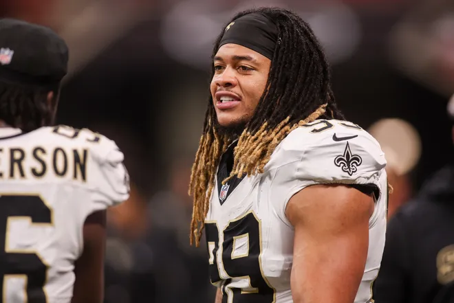 Jan 4, 2026; Atlanta, Georgia, USA; New Orleans Saints defensive end Chase Young (99) on the sideline against the Atlanta Falcons in the fourth quarter at Mercedes-Benz Stadium. Mandatory Credit: Brett Davis-Imagn Images