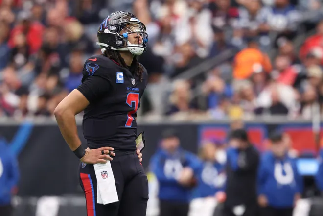 Jan 4, 2026; Houston, Texas, USA; Houston Texans quarterback C.J. Stroud (7) looks up at the scoreboard during the first half against the Indianapolis Colts at NRG Stadium. Mandatory Credit: Troy Taormina-Imagn Images