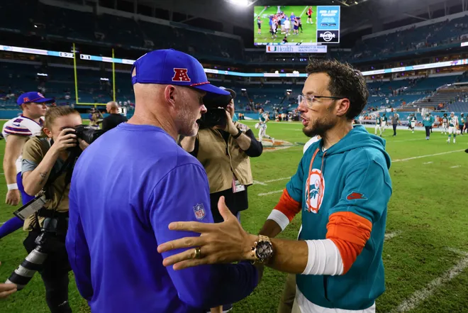 Sep 12, 2024; Miami Gardens, Florida, USA; Miami Dolphins head coach Mike McDaniel shakes hands with Buffalo Bills head coach Sean McDermott after the game at Hard Rock Stadium. Mandatory Credit: Sam Navarro-Imagn Images