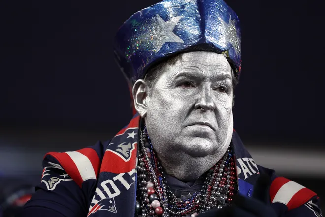 FOXBOROUGH, MASSACHUSETTS - JANUARY 11: A New England Patriots fan looks on during the first half of the AFC Wild Card Playoff game between the New England Patriots and the Los Angeles Chargers at Gillette Stadium on January 11, 2026 in Foxborough, Massachusetts. (Photo by Adam Glanzman/Getty Images)