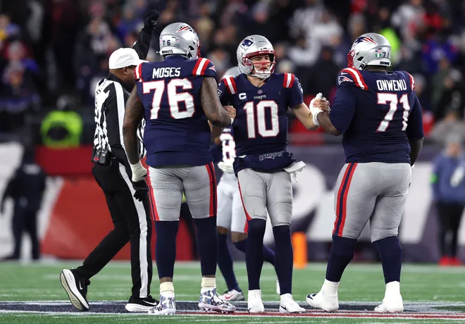 FOXBOROUGH, MASSACHUSETTS - JANUARY 11: Drake Maye #10 of the New England Patriots reacts after a play against the Los Angeles Chargers during the fourth quarter of the AFC Wild Card Playoff game at Gillette Stadium on January 11, 2026 in Foxborough, Massachusetts. (Photo by Adam Glanzman/Getty Images)
