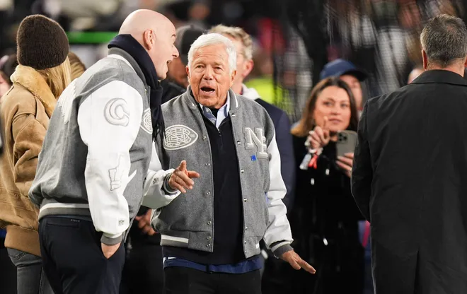 Jan 11, 2026; Foxborough, MA, USA; New England Patriots owner Robert Kraft speaks with FIFA President Gianni Infantino on the sideline during pregame warm ups before the game against the Los Angeles Chargers in an AFC Wild Card Round game at Gillette Stadium. Mandatory Credit: David Butler II-Imagn Images