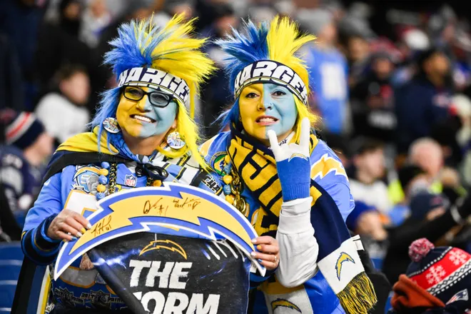 Jan 11, 2026; Foxborough, MA, USA; Los Angeles Chargers fans look on before the game against the New England Patriots in an AFC Wild Card Round game at Gillette Stadium. Mandatory Credit: Eric Canha-Imagn Images