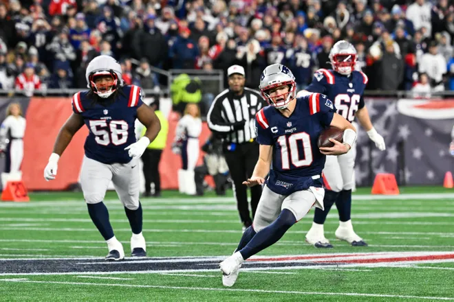 Jan 11, 2026; Foxborough, MA, USA; New England Patriots quarterback Drake Maye (10) scrambles during the first quarter against the Los Angeles Chargers in an AFC Wild Card Round game at Gillette Stadium. Mandatory Credit: Eric Canha-Imagn Images