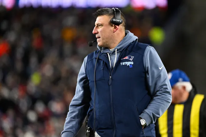 Jan 11, 2026; Foxborough, MA, USA; New England Patriots head coach Mike Vrabel looks on during the second quarter against the Los Angeles Chargers in an AFC Wild Card Round game at Gillette Stadium. Mandatory Credit: Eric Canha-Imagn Images