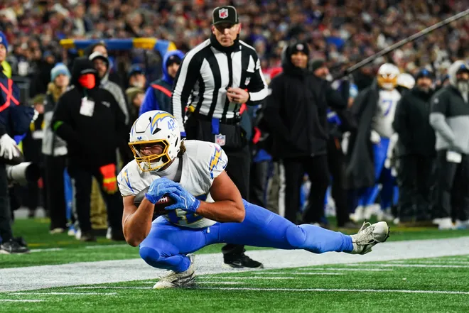 Jan 11, 2026; Foxborough, MA, USA; Los Angeles Chargers tight end Tucker Fisk (42) makes a catch for a first down during the second quarter against the New England Patriots in an AFC Wild Card Round game at Gillette Stadium. Mandatory Credit: David Butler II-Imagn Images