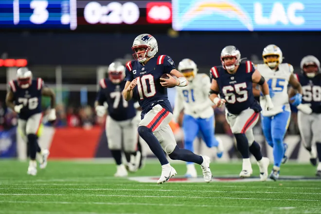 Jan 11, 2026; Foxborough, MA, USA; New England Patriots quarterback Drake Maye (10) rushes during the second quarter against the Los Angeles Chargers in an AFC Wild Card Round game at Gillette Stadium. Mandatory Credit: David Butler II-Imagn Images