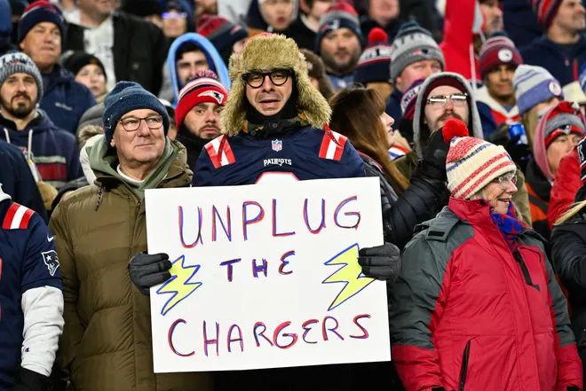 Jan 11, 2026; Foxborough, MA, USA; New England Patriots fans cheer during the fourth quarter against the Los Angeles Chargers in an AFC Wild Card Round game at Gillette Stadium. Mandatory Credit: Eric Canha-Imagn Images